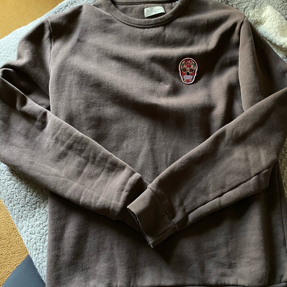 Suspicious Antwerp crew neck